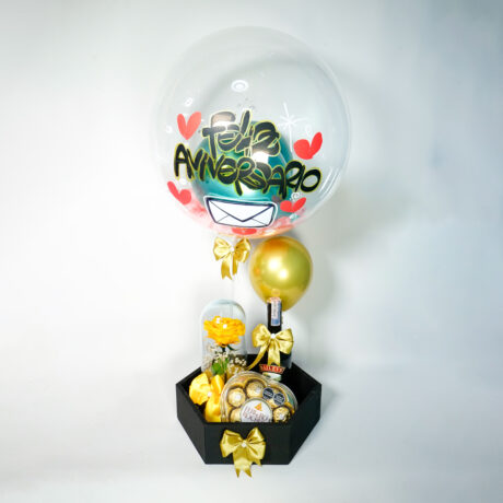 bandeja con chocolates ferrero, rosa preservada amarilla y baileys