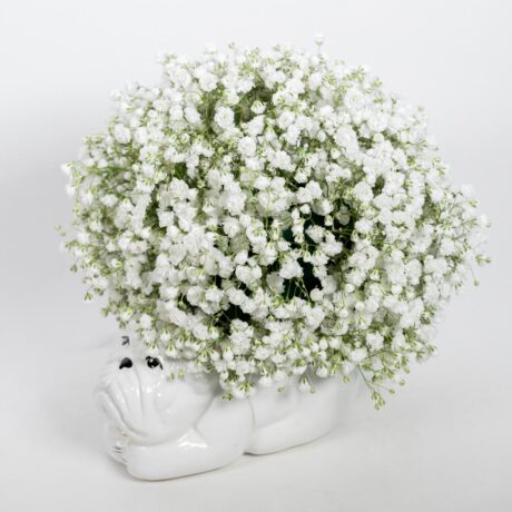 florero en forma de perrito acostado